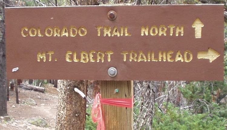 Sign on trail for right turn on the way out