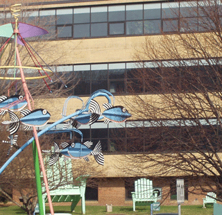 Lawn chairs and a mobile. 